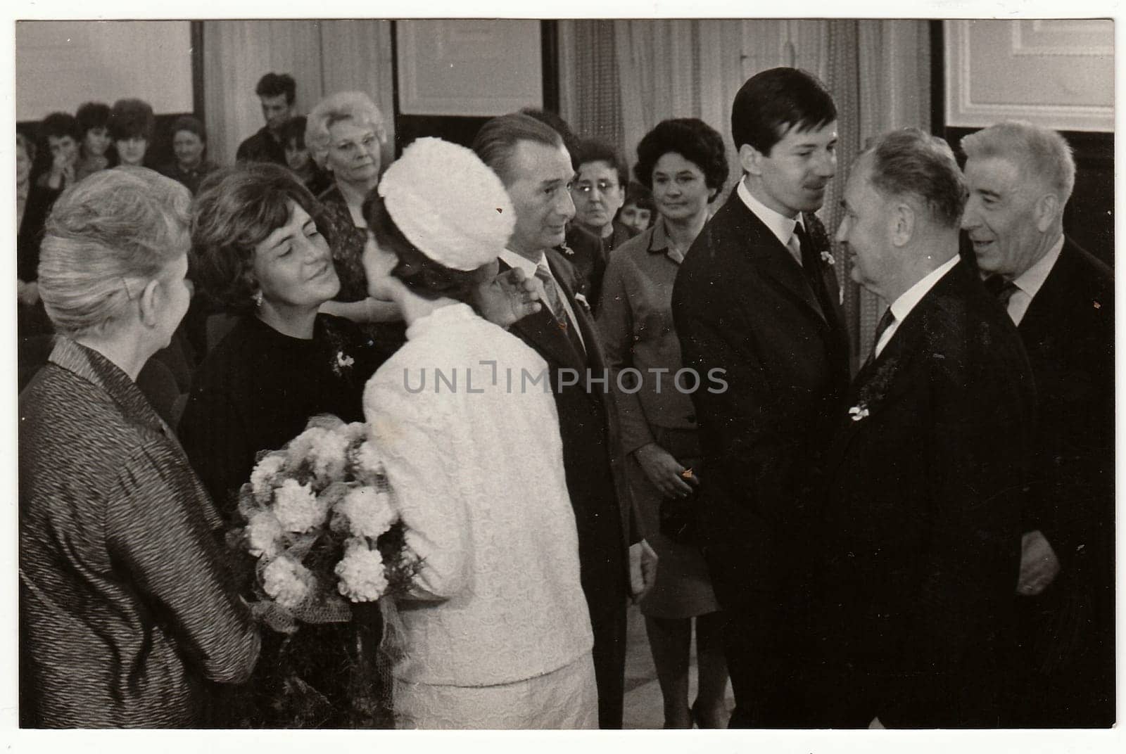 TEPLICE, THE CZECHOSLOVAK SOCIALIST REPUBLIC - OCTOBER 15, 1966: Vintage photo of wedding ceremony (congratulation)