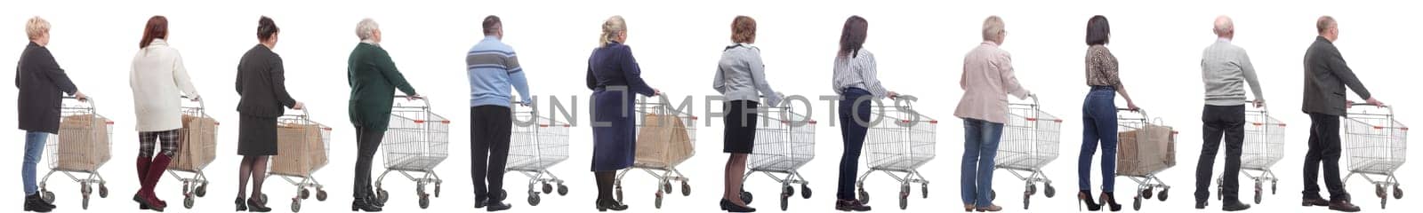 a group of people with a cart stand with their backs isolated on a white background