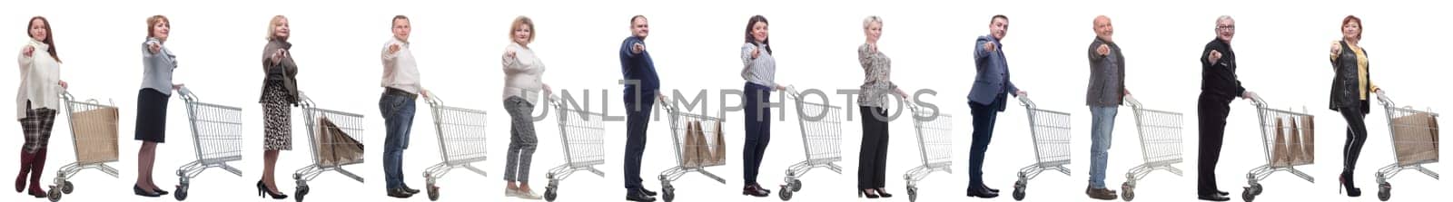 a group of people with a shopping cart point their finger at the camera on a white background