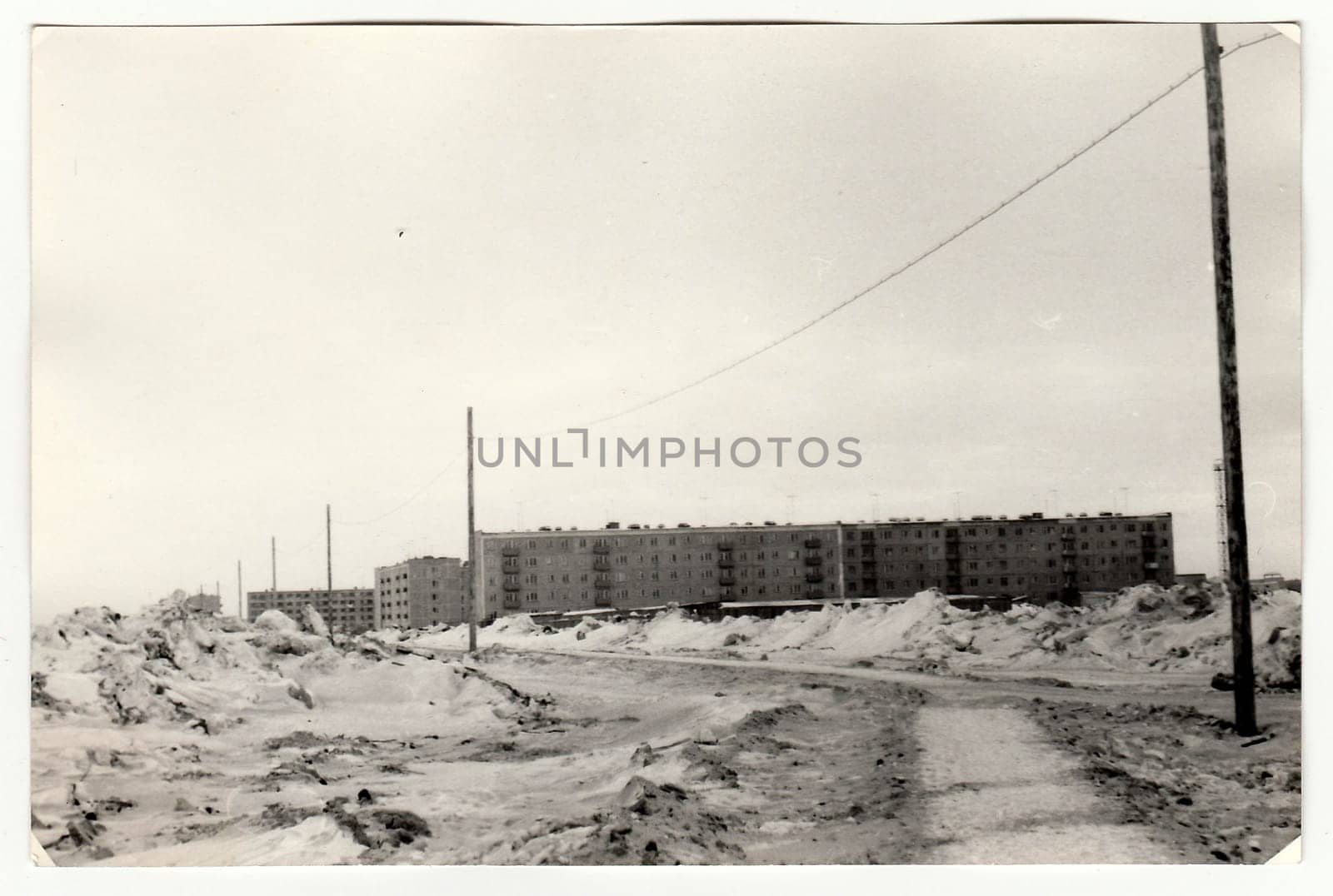 USSR - CIRCA 1970s: Vintage photo shows construction of blocks of flats in USSR. Winter time.