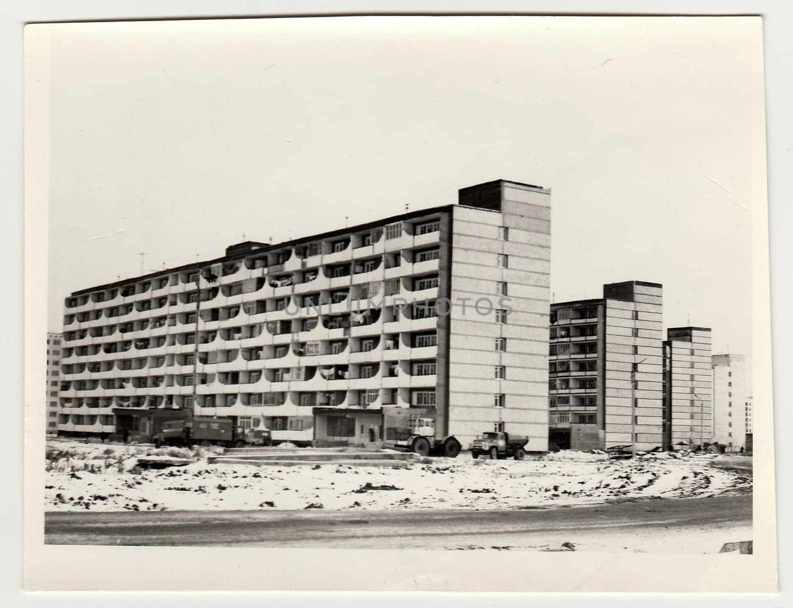 Vintage photo shows construction of blocks of flats in USSR. Winter time. by roman_nerud