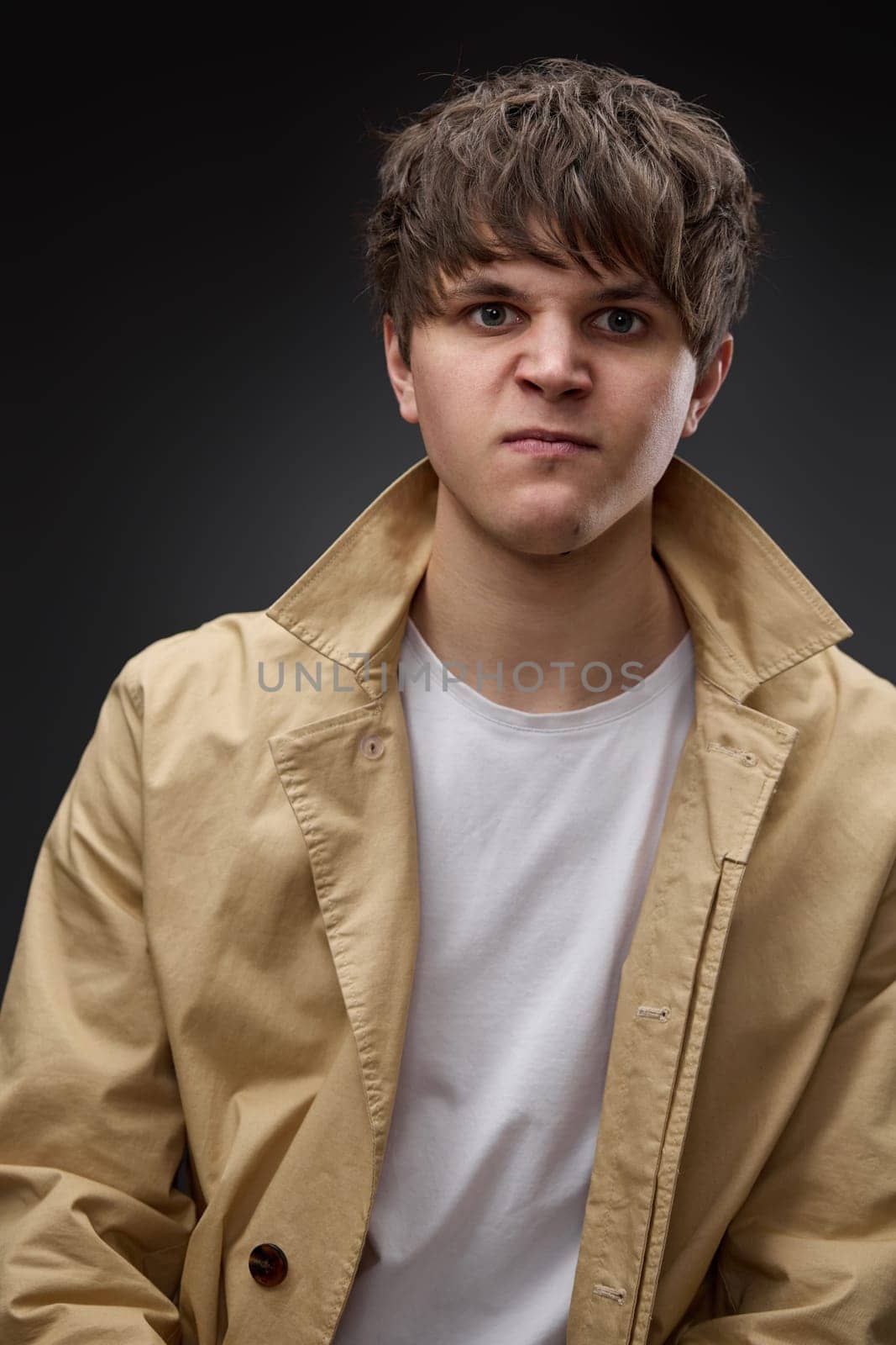 portrait of caucasian man with hairstyle in coat by erstudio