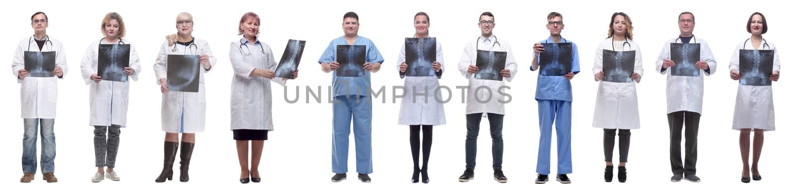 group of doctors holding x-ray isolated on white background