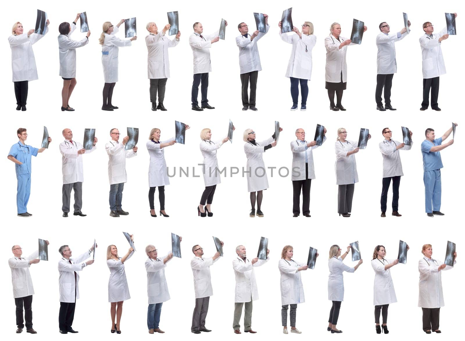 group of doctors holding x-ray isolated on white background