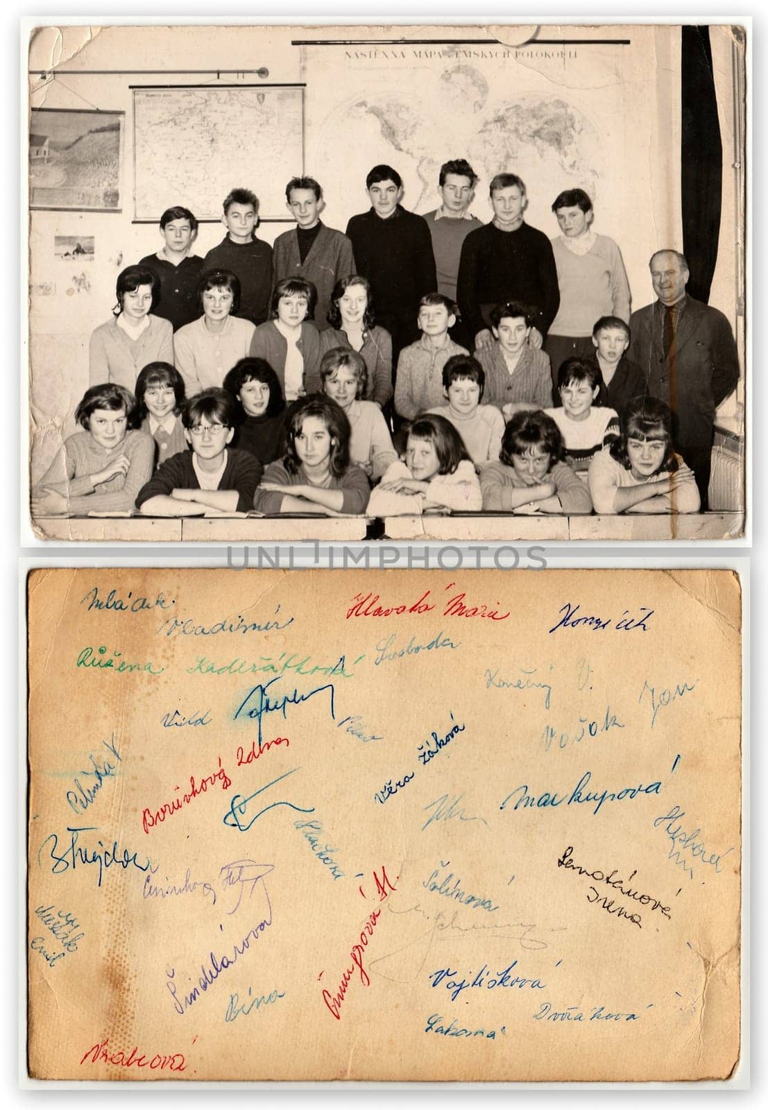 Retro photo shows students with male teacher in the classroom. The back of vintage photo shows signatures. by roman_nerud