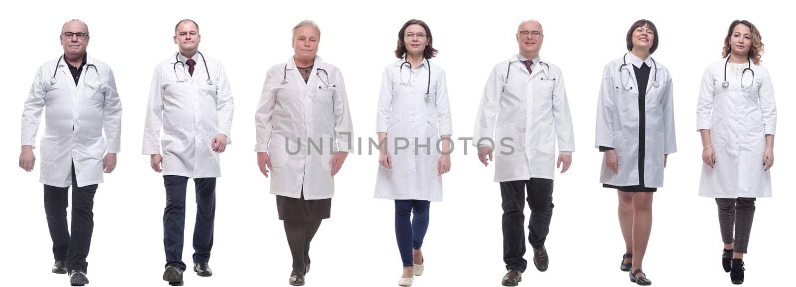 group of doctors in motion isolated on white by asdf