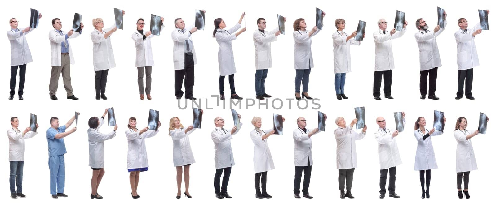 group of doctors holding x-ray isolated on white background