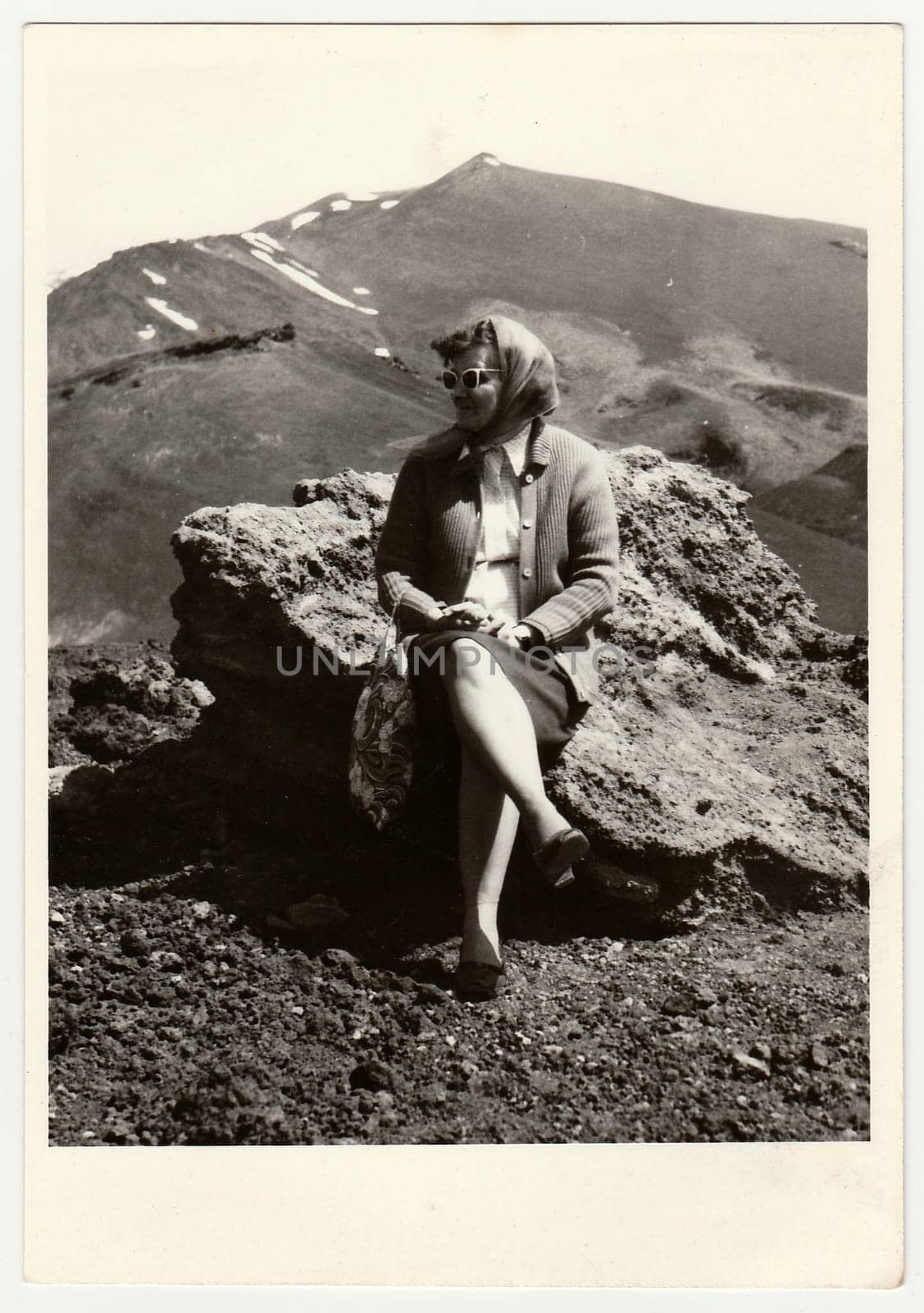 Vintage photo shows woman on vacation. by roman_nerud