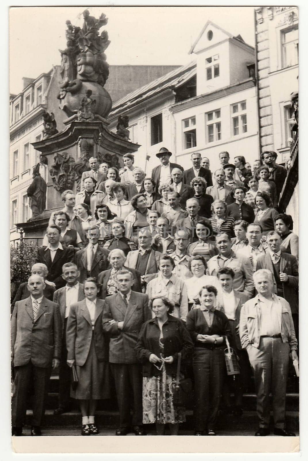 Vintage photo shows group of people on vacation. by roman_nerud