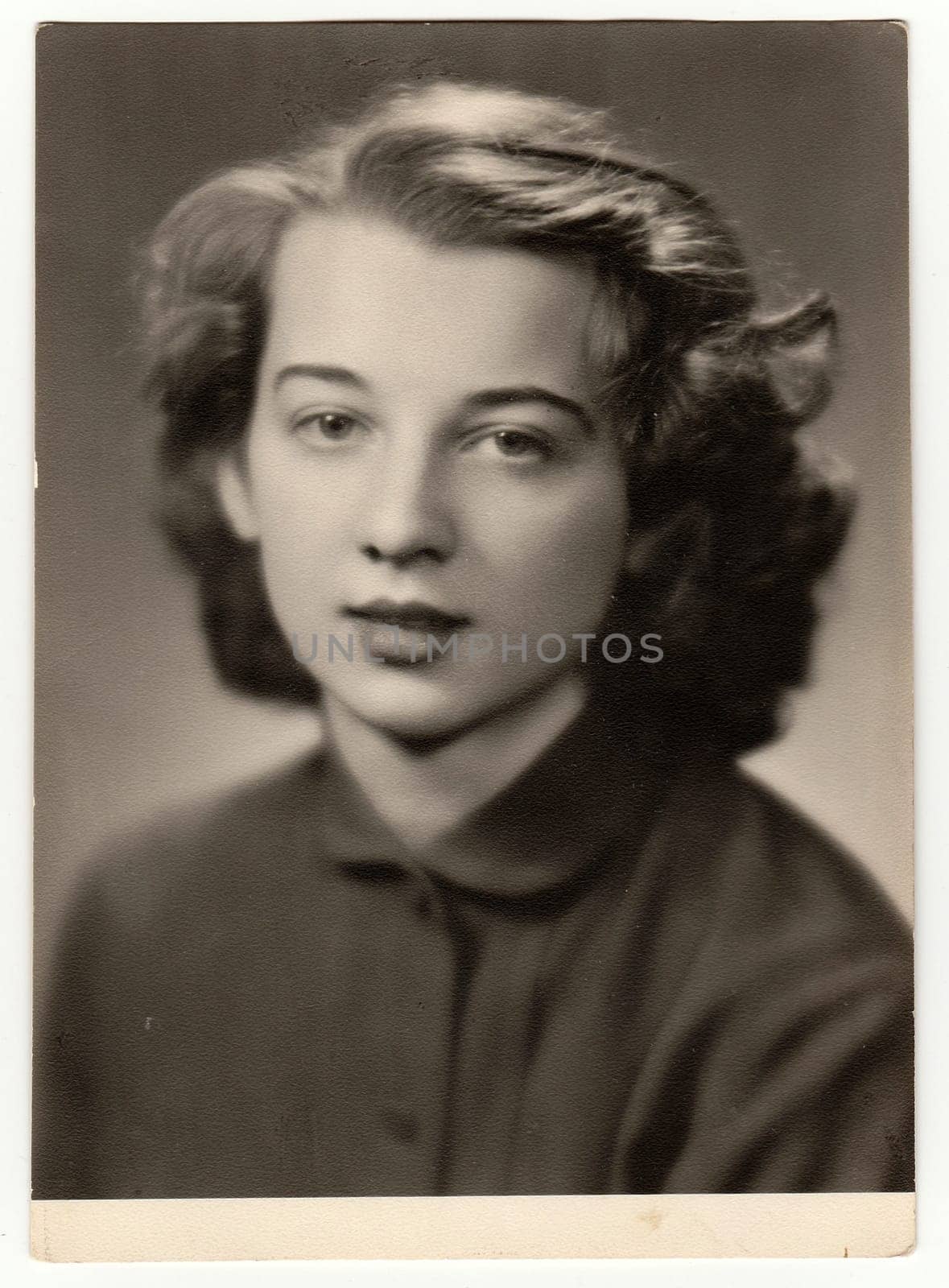 THE CZECHOSLOVAK SOCIALIST REPUBLIC - CIRCA 1960s: Vintage photo of girl. Photo was taken in graduation time.