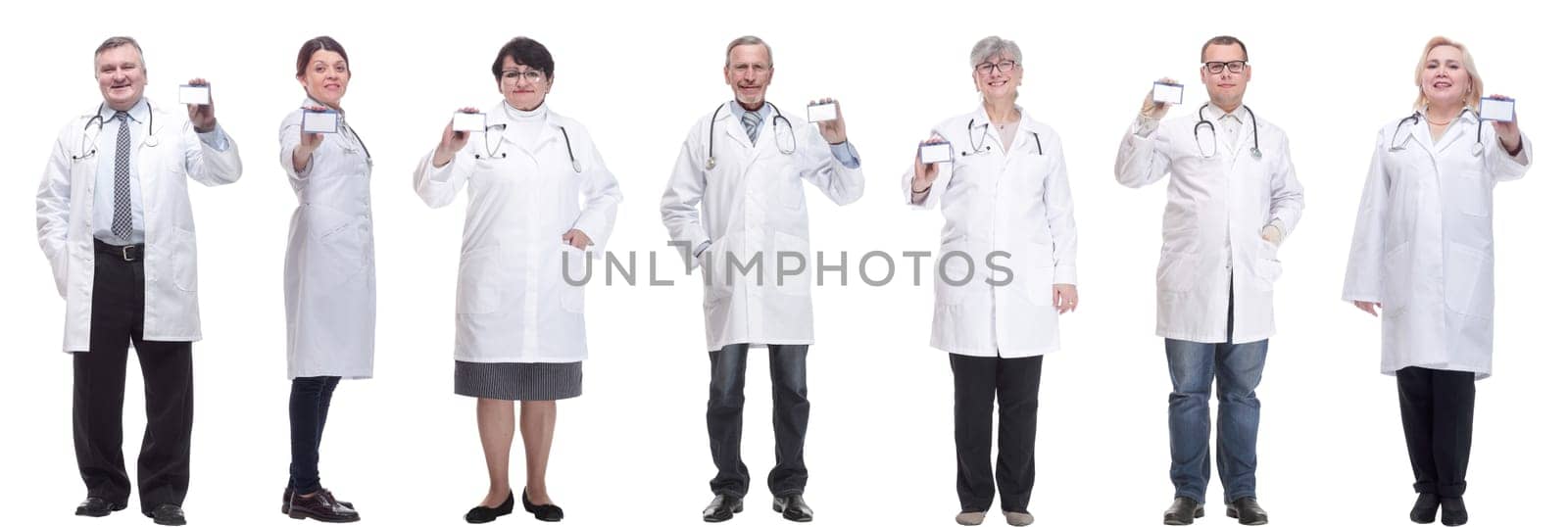 full length group of doctors showing badge isolated by asdf