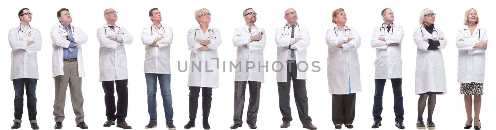 group of doctors standing in full length isolated on white background