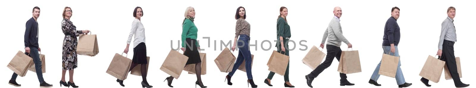 a line of people with shopping bags. side view by asdf