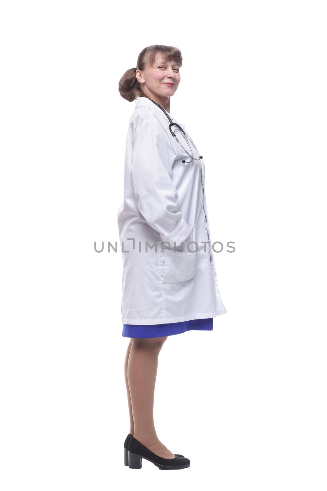Profile of a woman doctor with stethoscope on a white background looking at camera