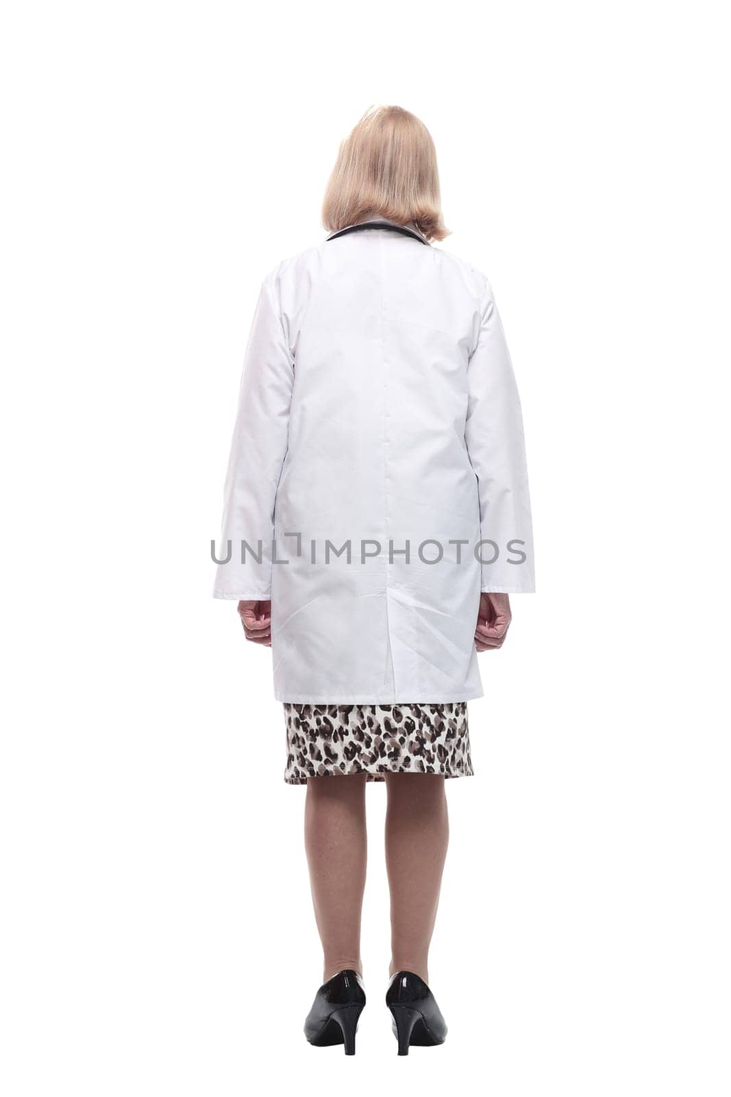 rear view. female doctor in a white coat. isolated on a white background.