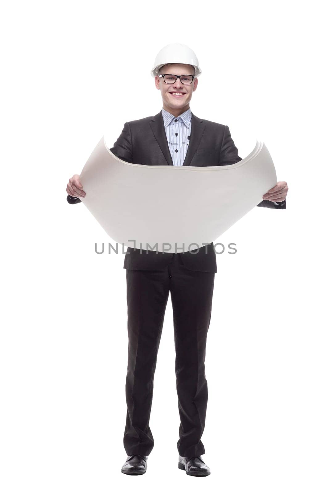 in full growth. young architect with drawings. isolated on a white background.