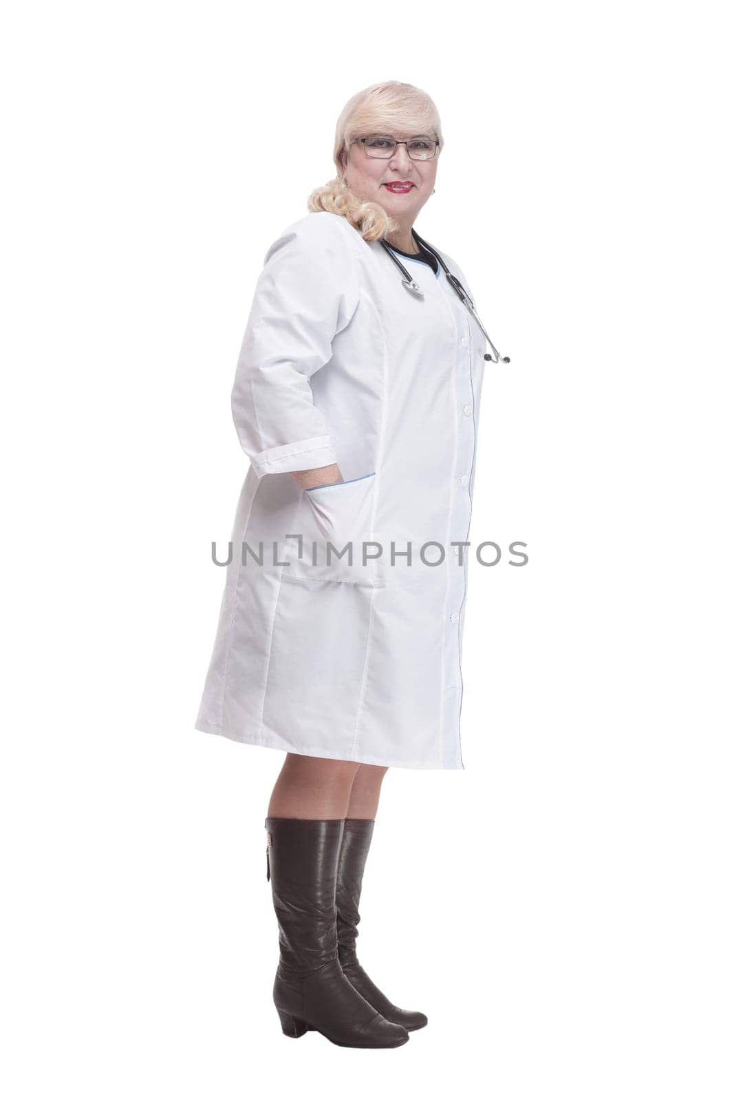 Mature female paramedic with a stethoscope . isolated on a white background.