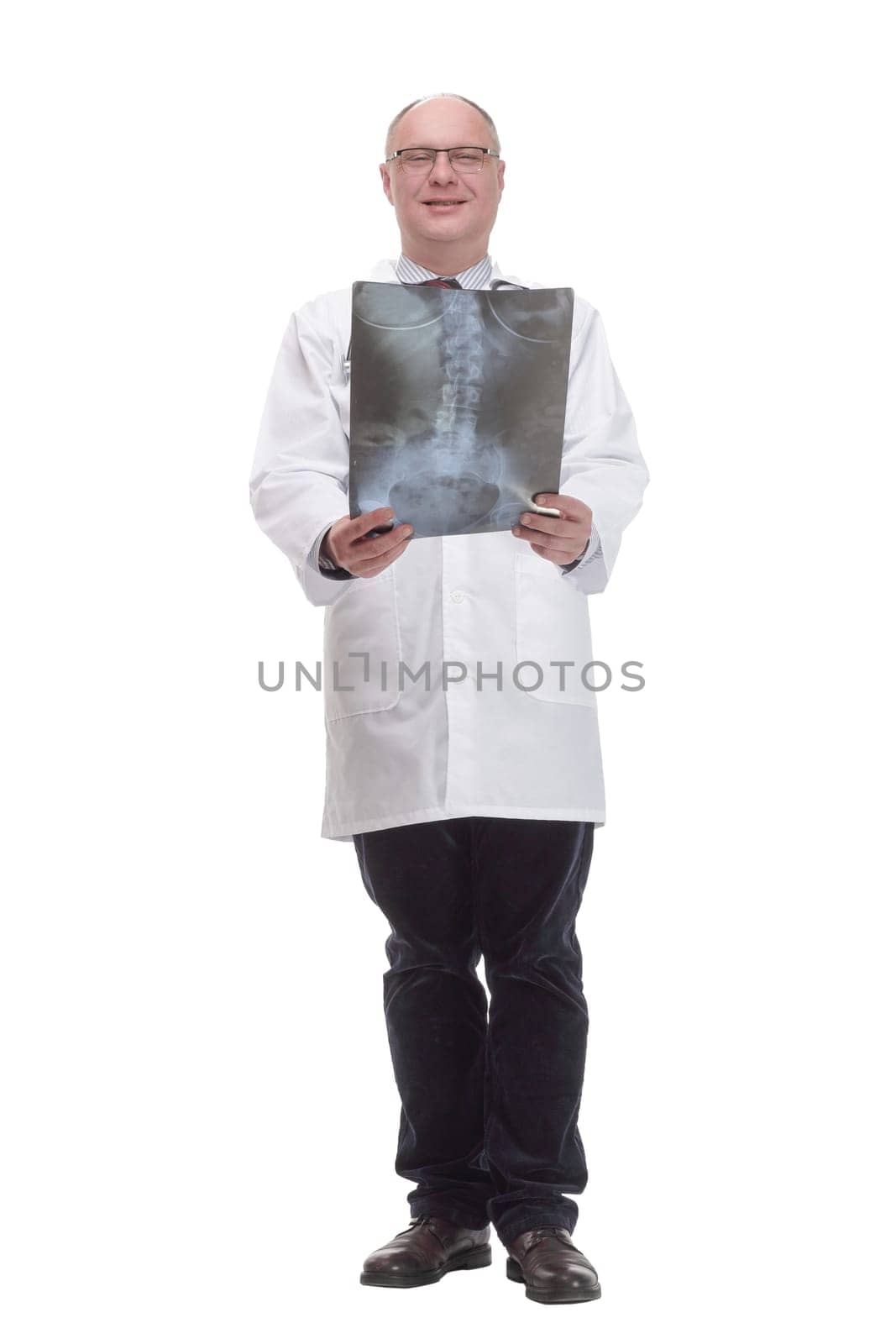 full-length. mature doctor in a white coat striding forward .isolated on a white background.