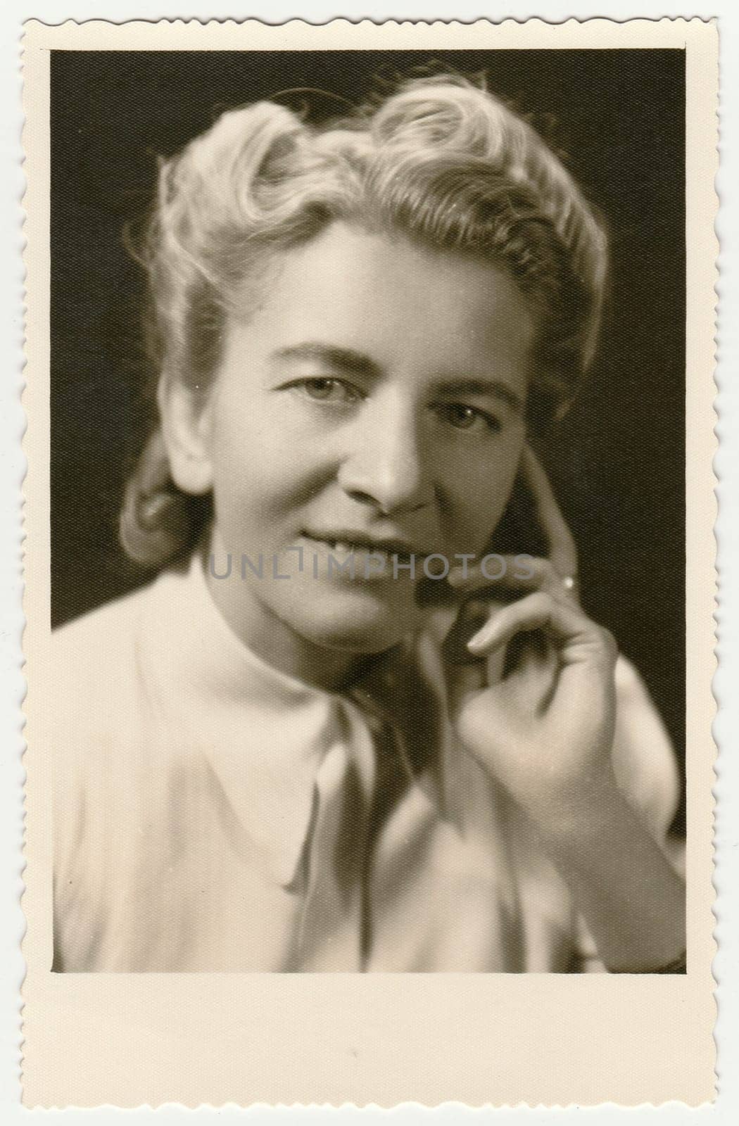 Vintage photo shows woman. Antique black & white photo. by roman_nerud