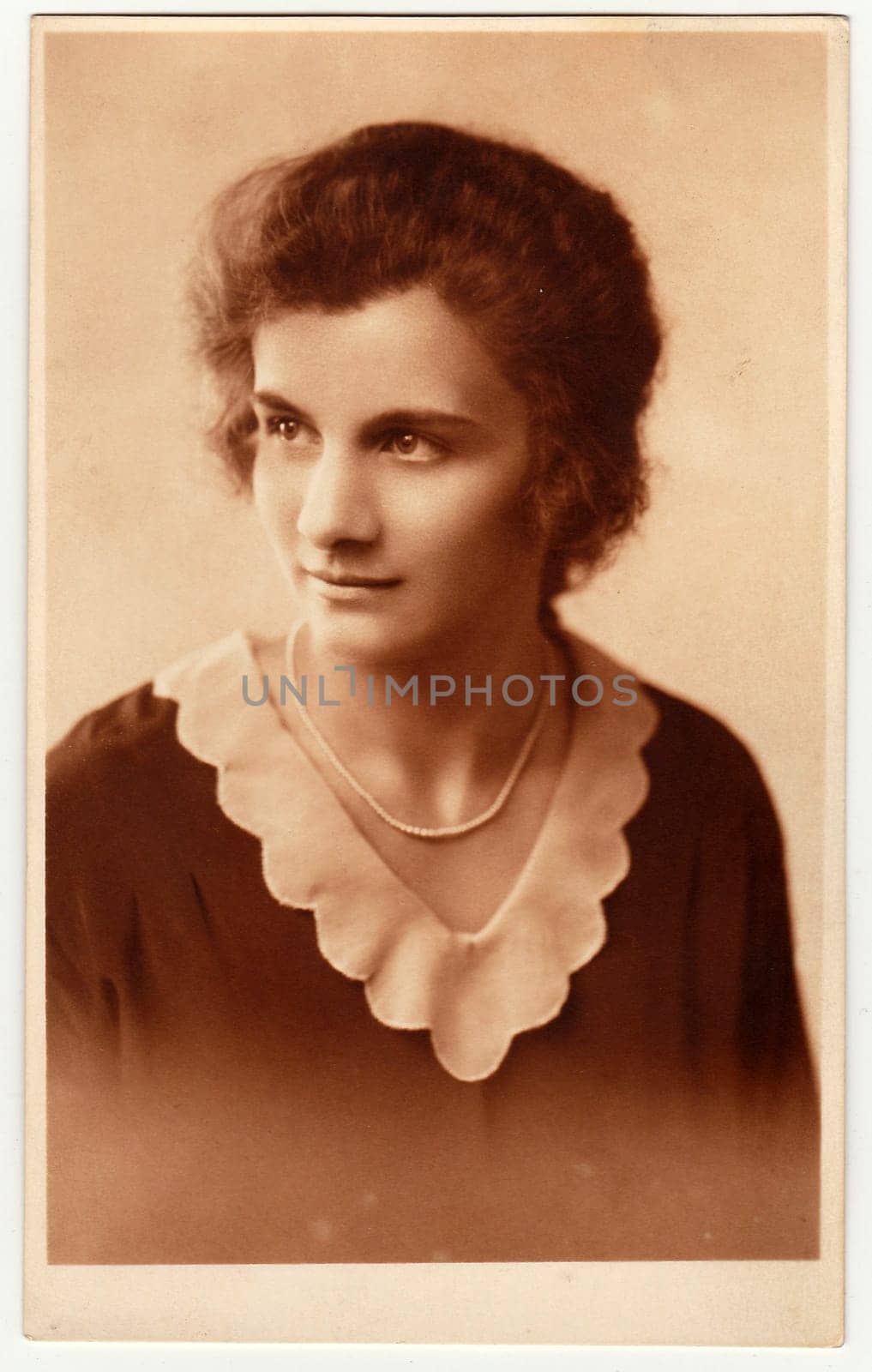 THE CZECHOSLOVAK SOCIALIST REPUBLIC - CIRCA 1930s: Vintage photo shows woman. Photo has sepia tint.