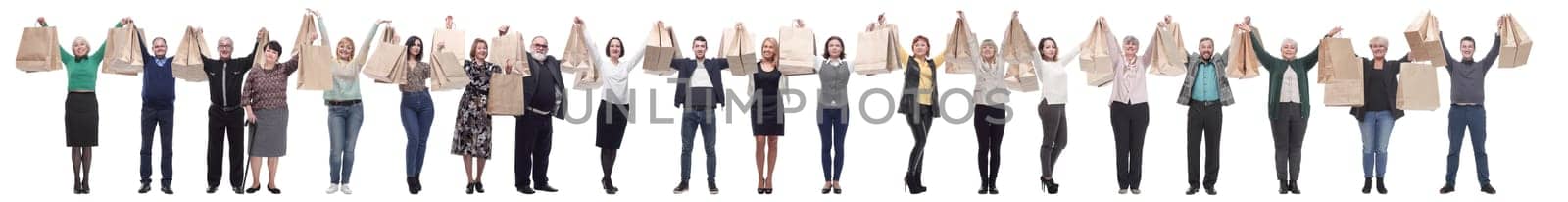 a group of people are running paper shopping bags by asdf