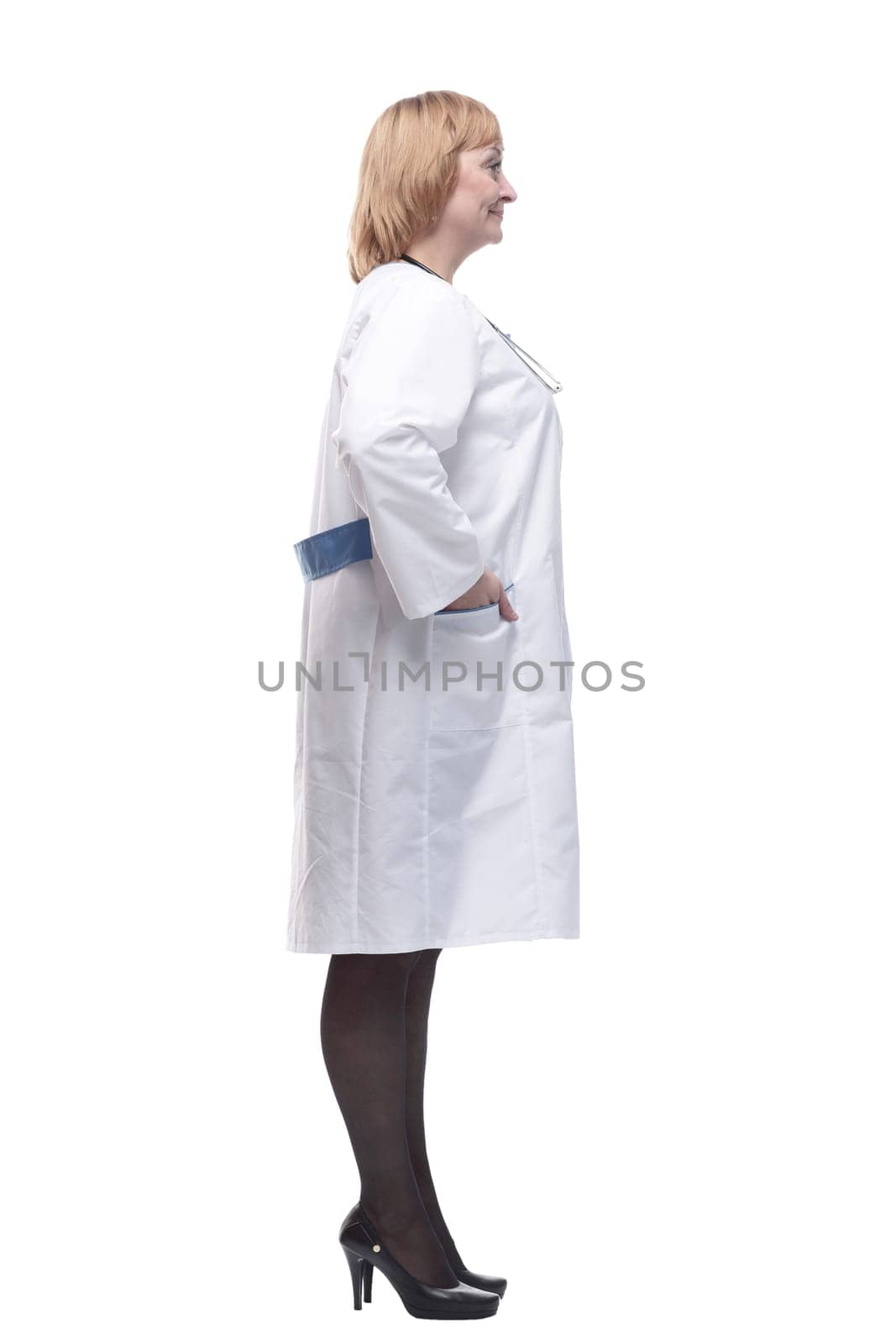 in full growth.friendly female doctor with a stethoscope. isolated on a white background.