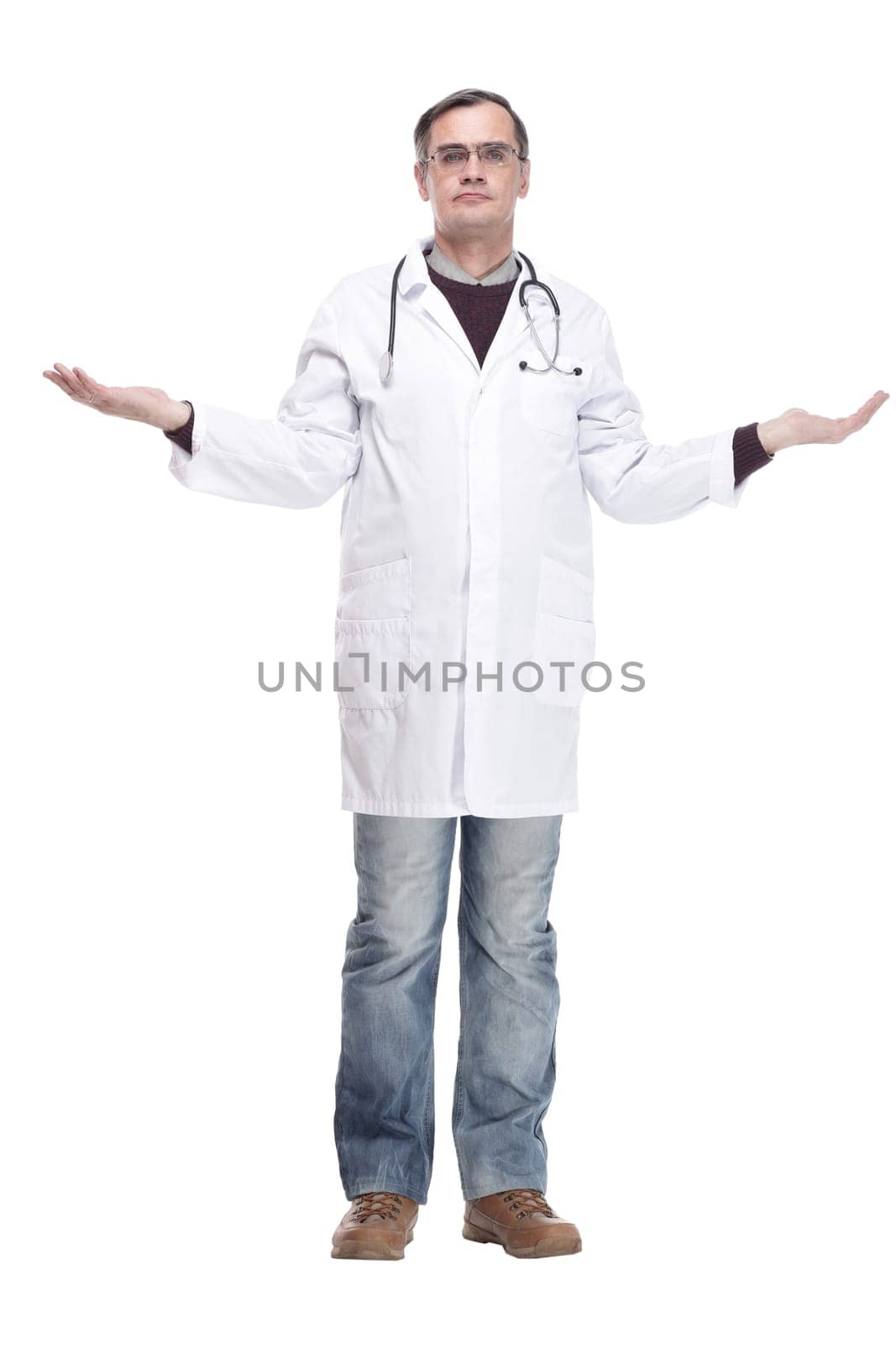 in full growth. qualified doctor with a stethoscope. isolated on a white background.