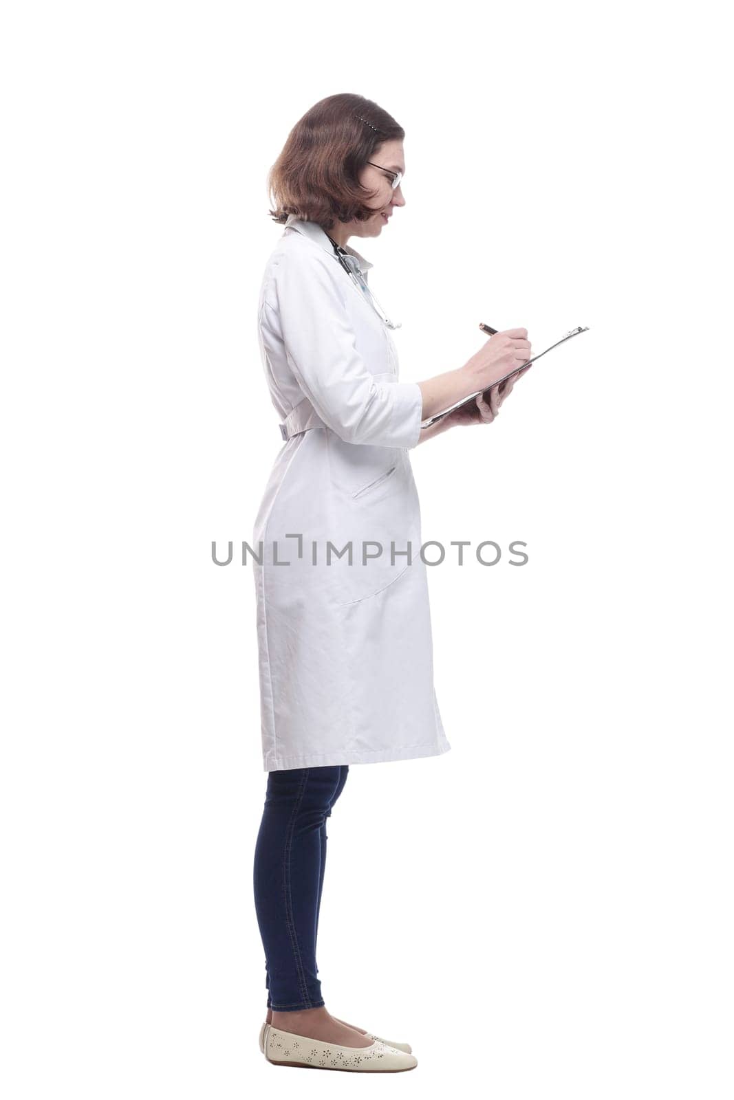 Mature female doctor with clipboard. isolated on a white background.