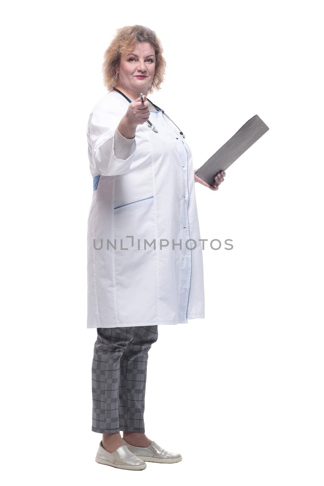 full-length. senior female doctor with clipboard. isolated on a white background.