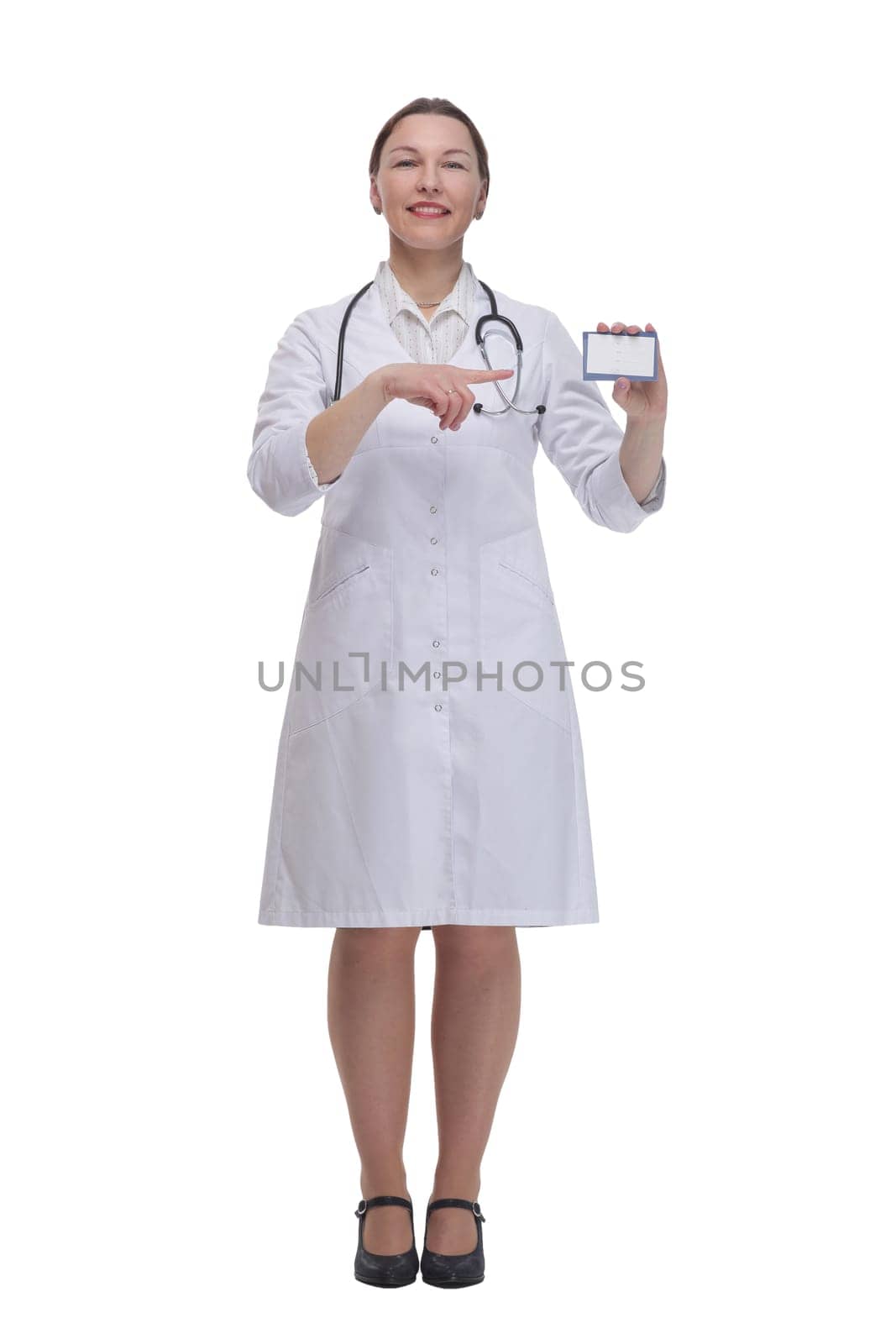 in full growth.medical doctor woman showing her visiting card. isolated on a white background.