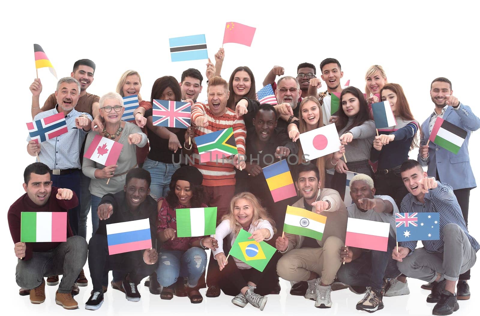 in full growth. a multinational large group of people pointing at you . isolated on white background
