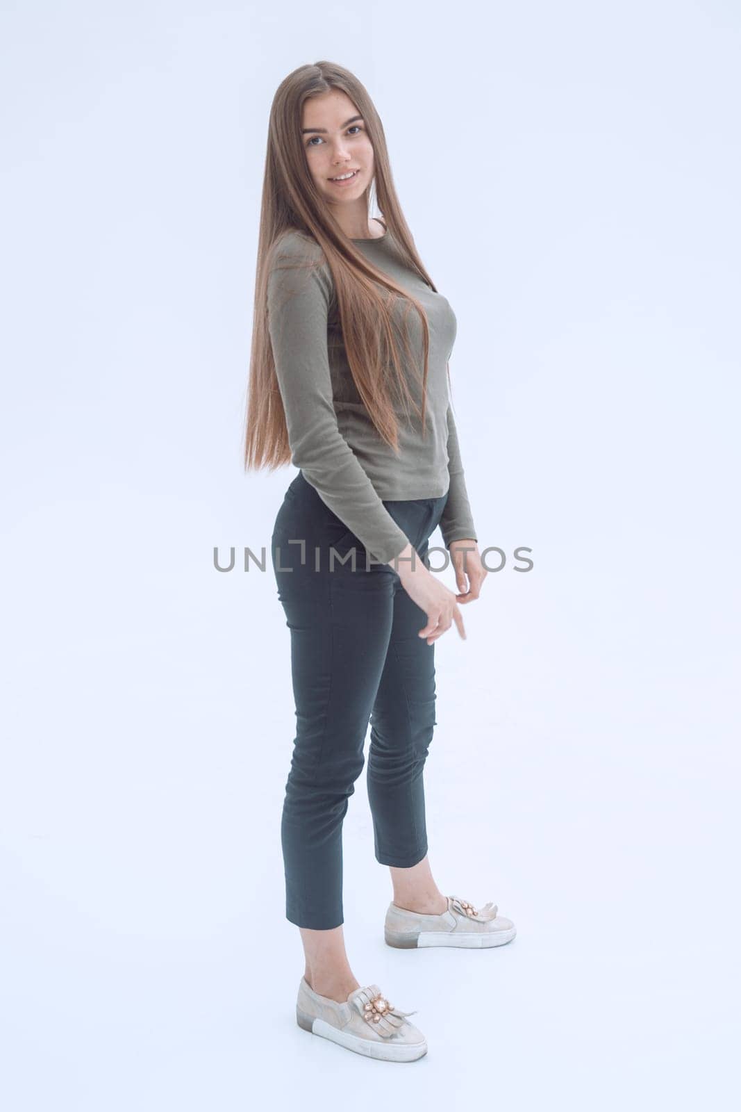 modern casual girl looking at the camera. isolated on white background