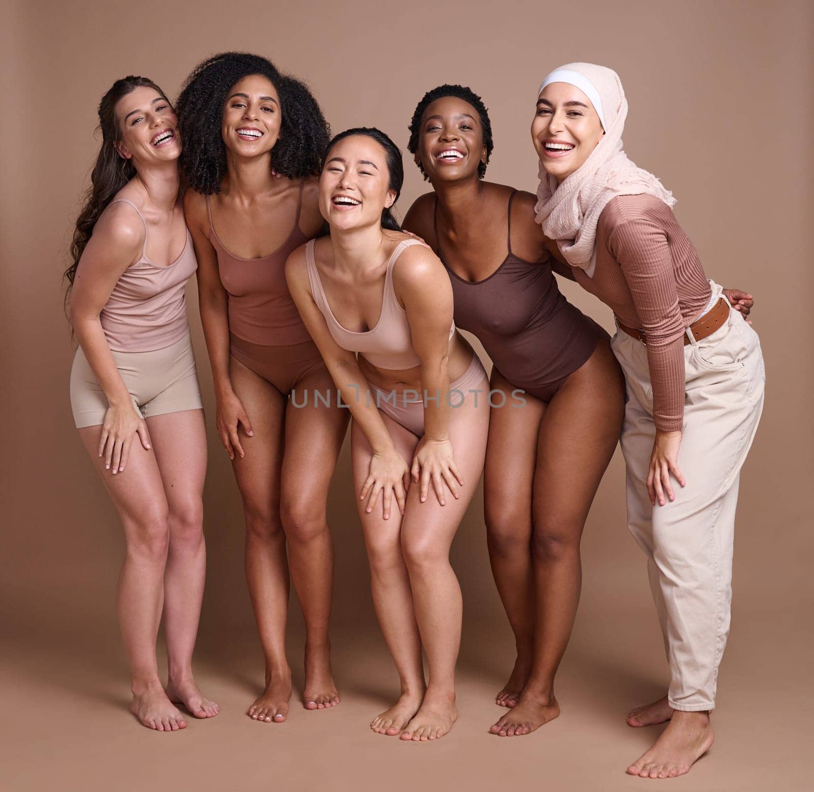 Diversity, women and beauty in studio for self love, global community and support, wellness and healthy skincare. Portrait, female and happy models, body positive group and inclusion with solidarity by YuriArcurs