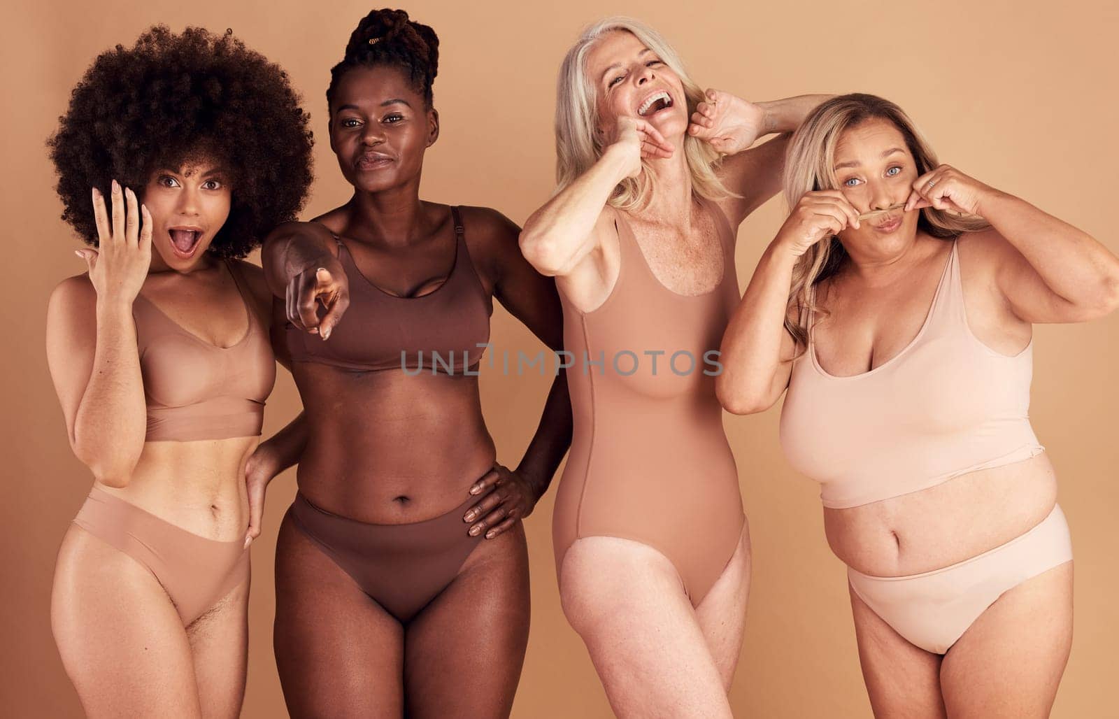 Women, body and beauty with diversity and underwear, body positivity and inclusivity, playful on studio background. Smile, portrait and fitness with skin and different shape and size, young and old