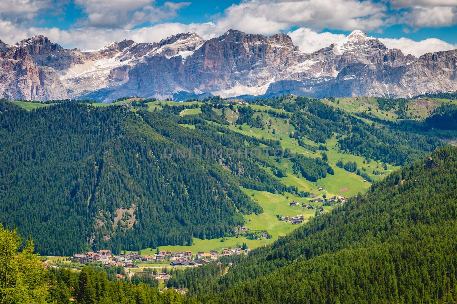 Idyllic landscape in Gardena pass valley and Sassolungo massif, italian Dolomites at springtime, Italy