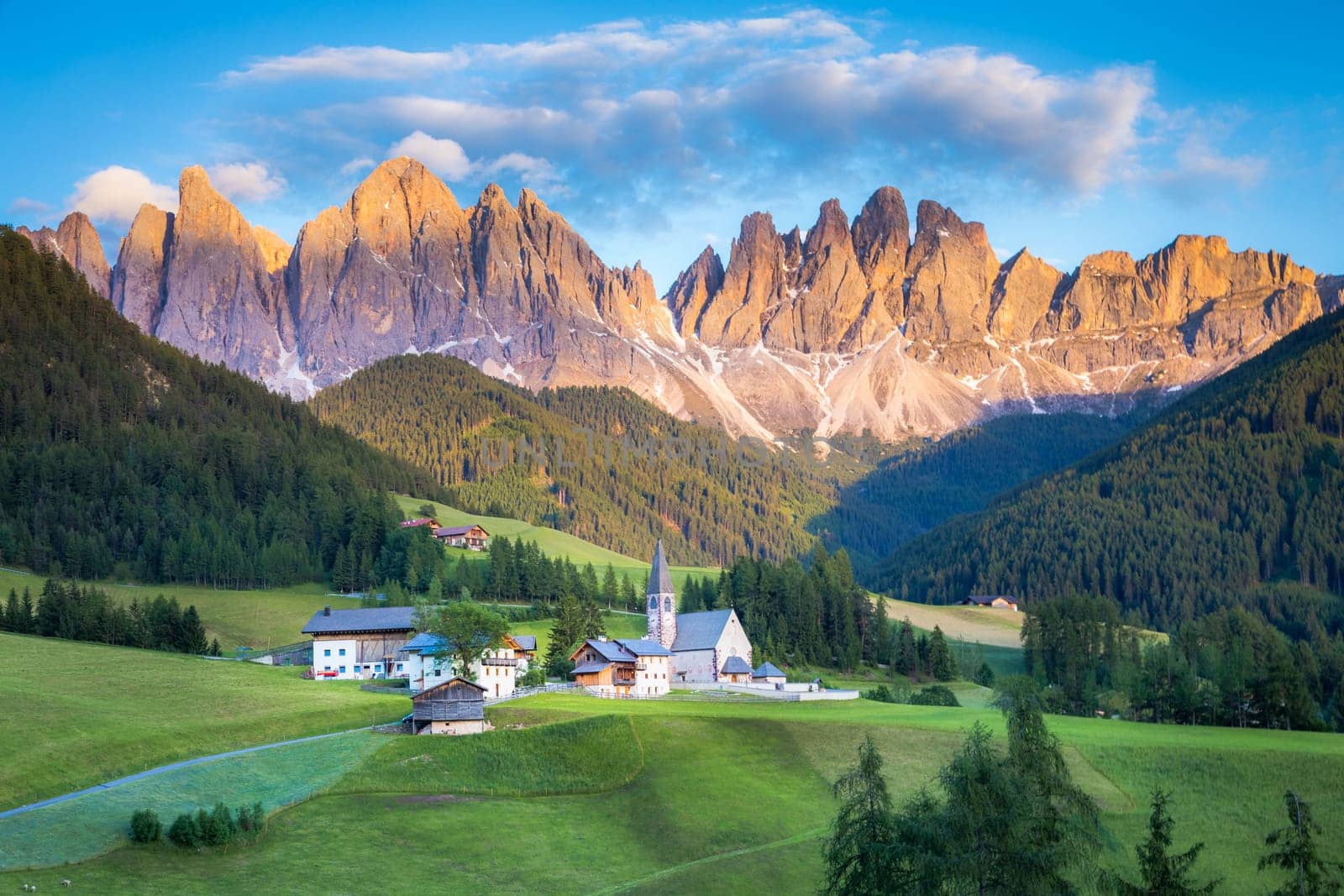 Santa Magdalena village in Val di Funes on the italian Dolomites at sunset, Italy