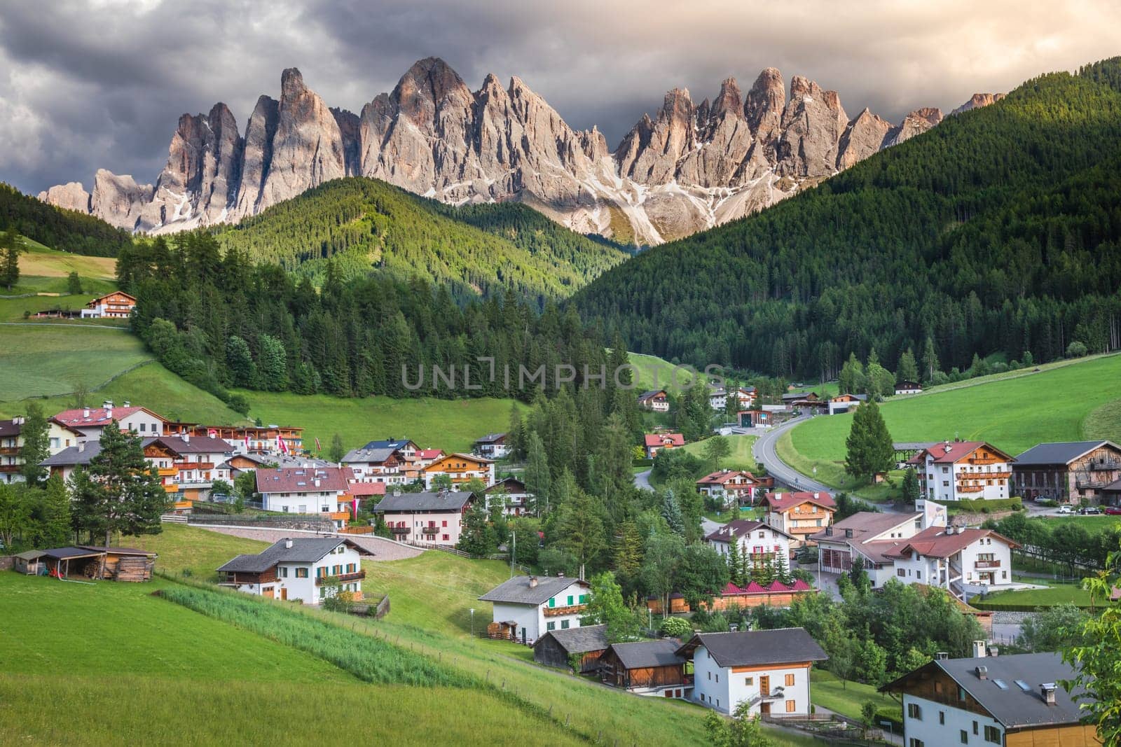 Santa Magdalena village in Val di Funes on the italian Dolomites at sunset, Italy