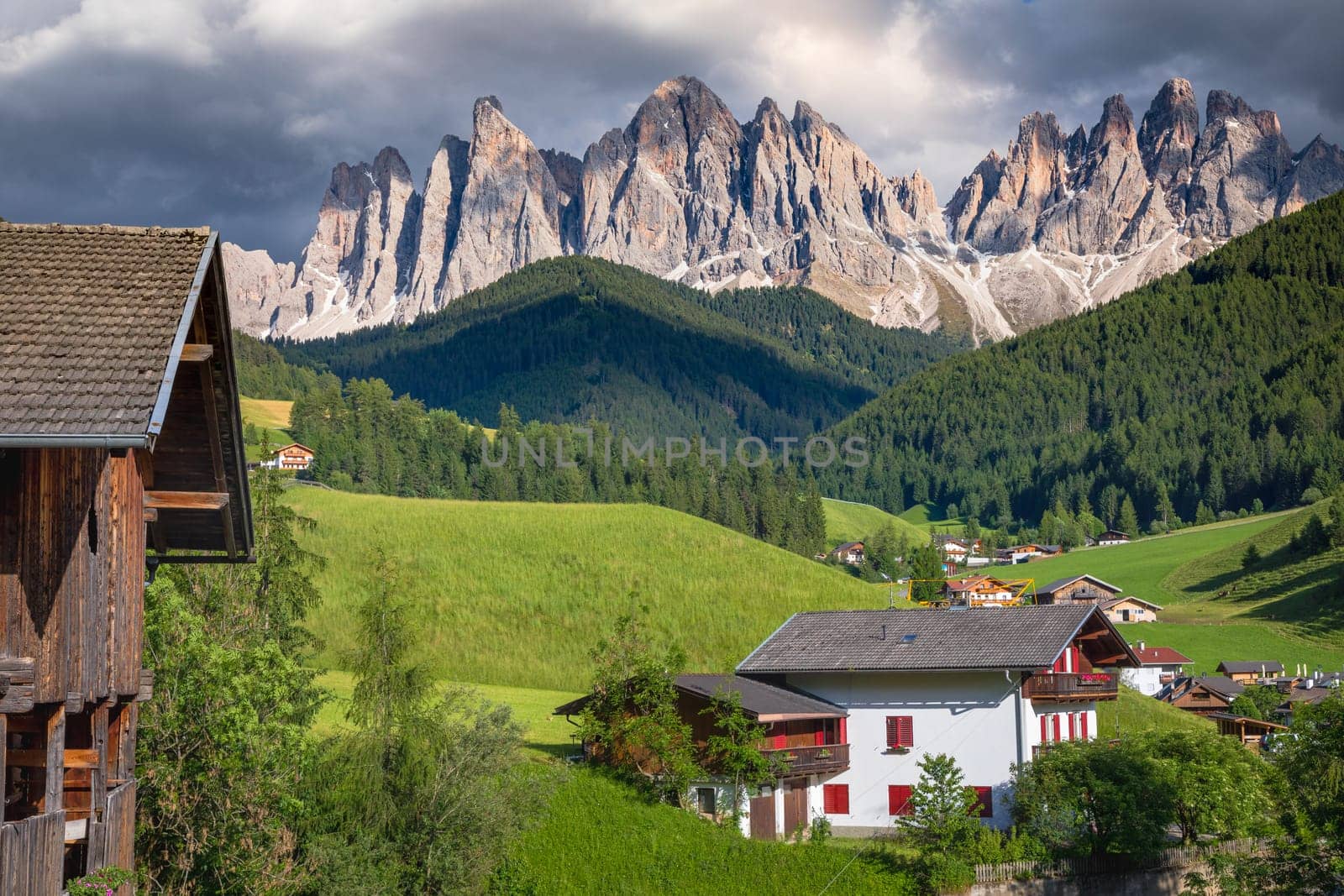 Santa Magdalena village in Val di Funes on the italian Dolomites at sunset, Italy