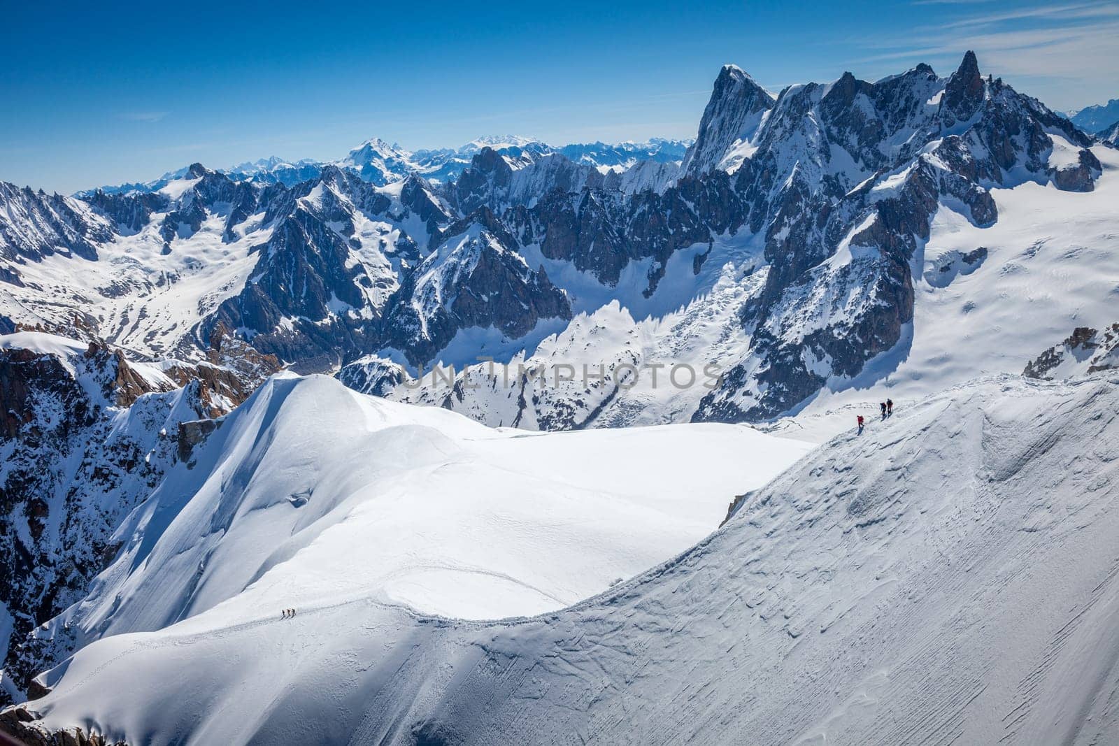 Mont blanc peak and massif, mountain climbing above glaciers, French Alps, France