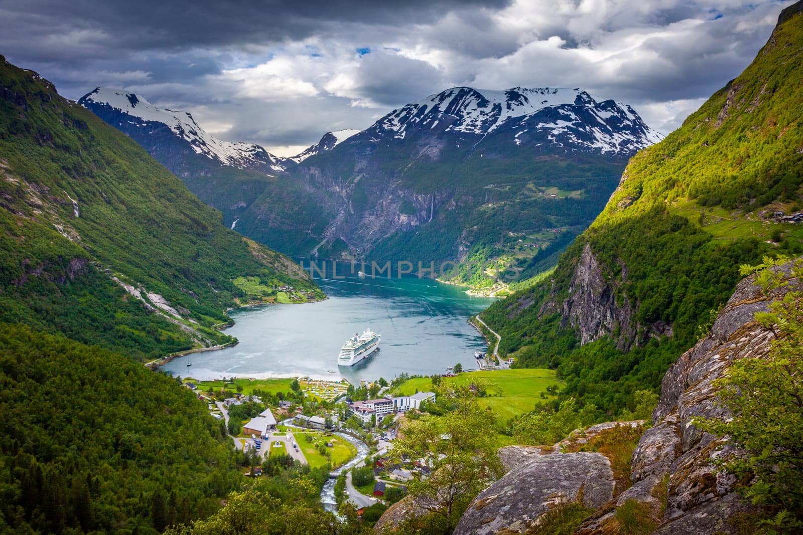 Idyllic Geiranger fjord and village at sunset, Norway, Scaninavia, Northern Europe