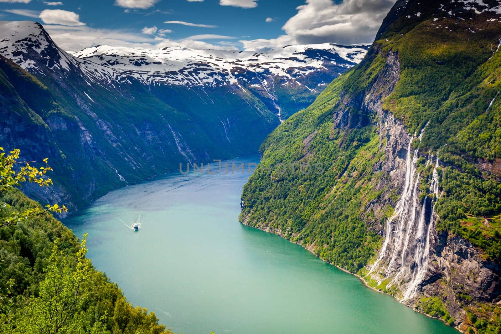 Idyllic Geirangerfjord and Seven Sisters Waterfalls at sunset, Norway, Northern Europe