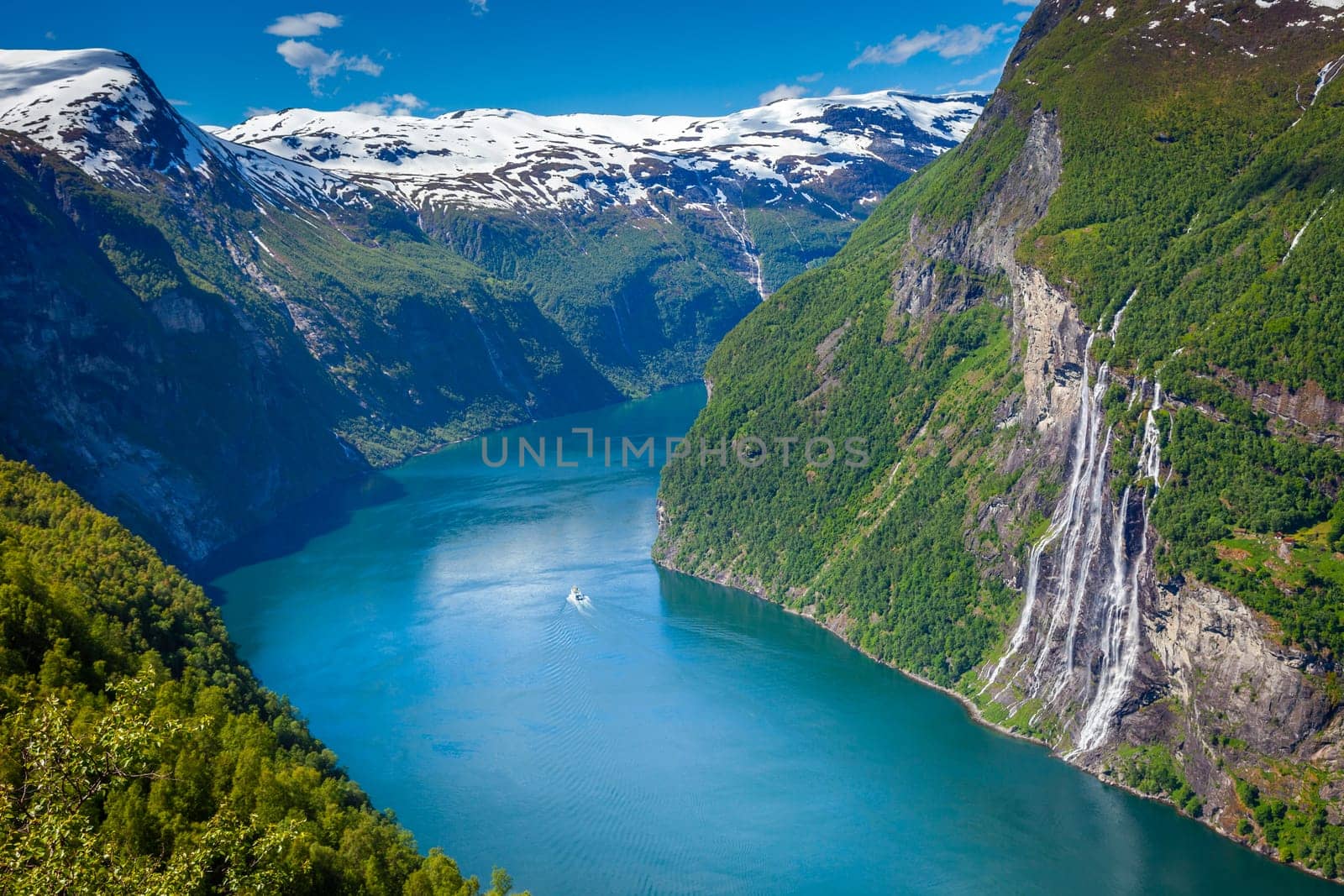 Idyllic Geirangerfjord and Seven Sisters Waterfalls at sunset, Norway, Northern Europe