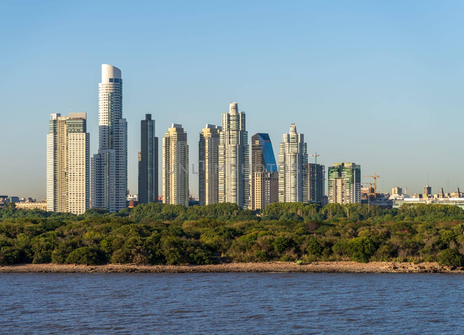 Large modern apartment buildings of Puerto Madero by the shoreline in Buenos Aires Argentina
