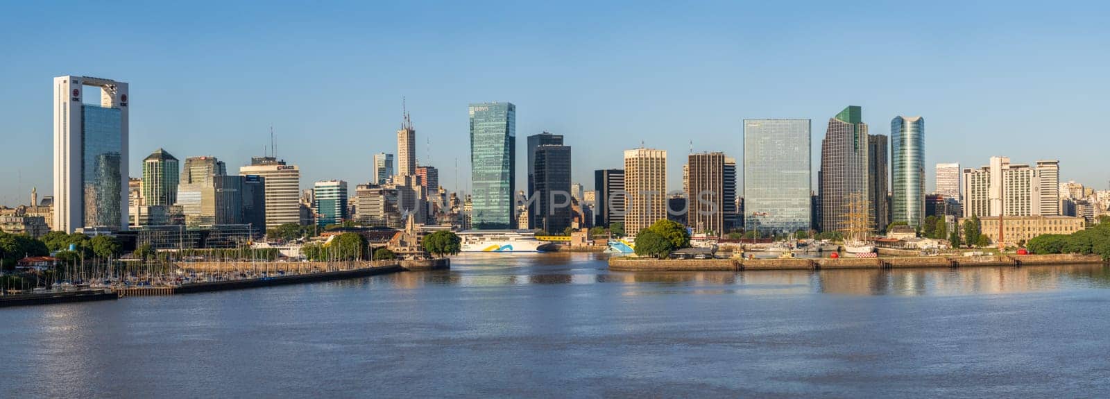 Buenos Aires, Argentina - 6 February 2023: Wide panorama of the city skyline at the entrance to the port