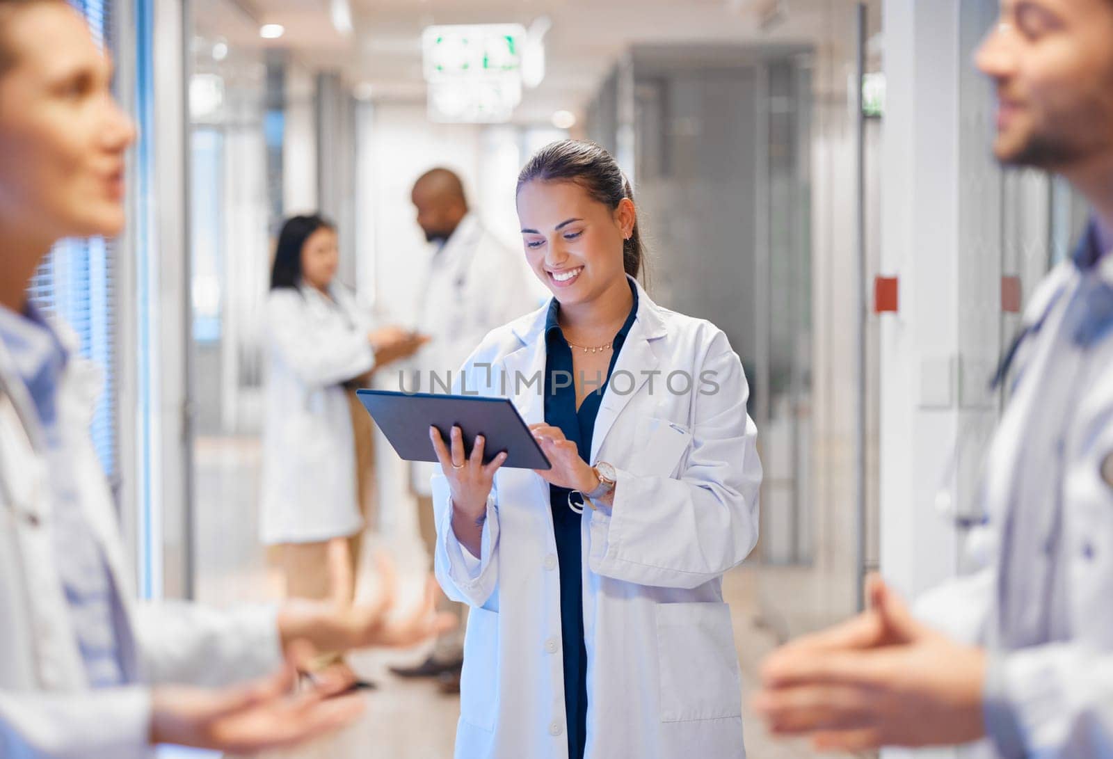 Happy woman doctor on tablet for employees management, hospital workflow and clinic staff solution on software or app. Healthcare manager on digital tech for medical team research or problem solving.