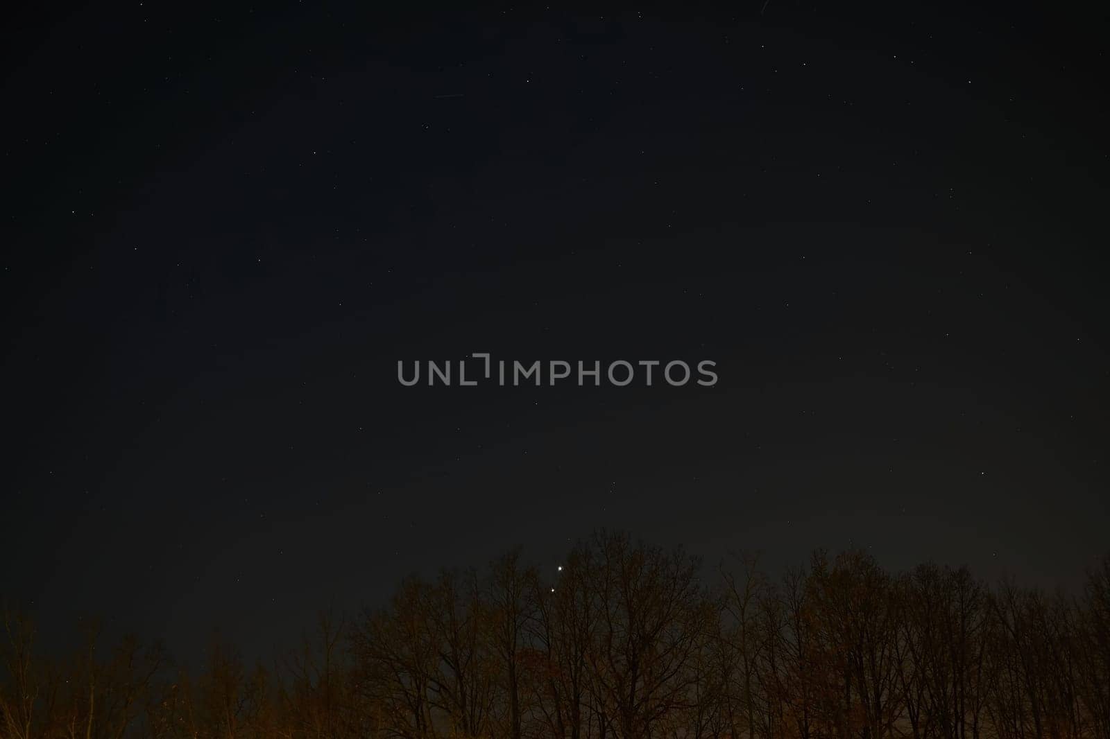 Conjunction of Venus with Jupiter. Night sky - universe with stars.