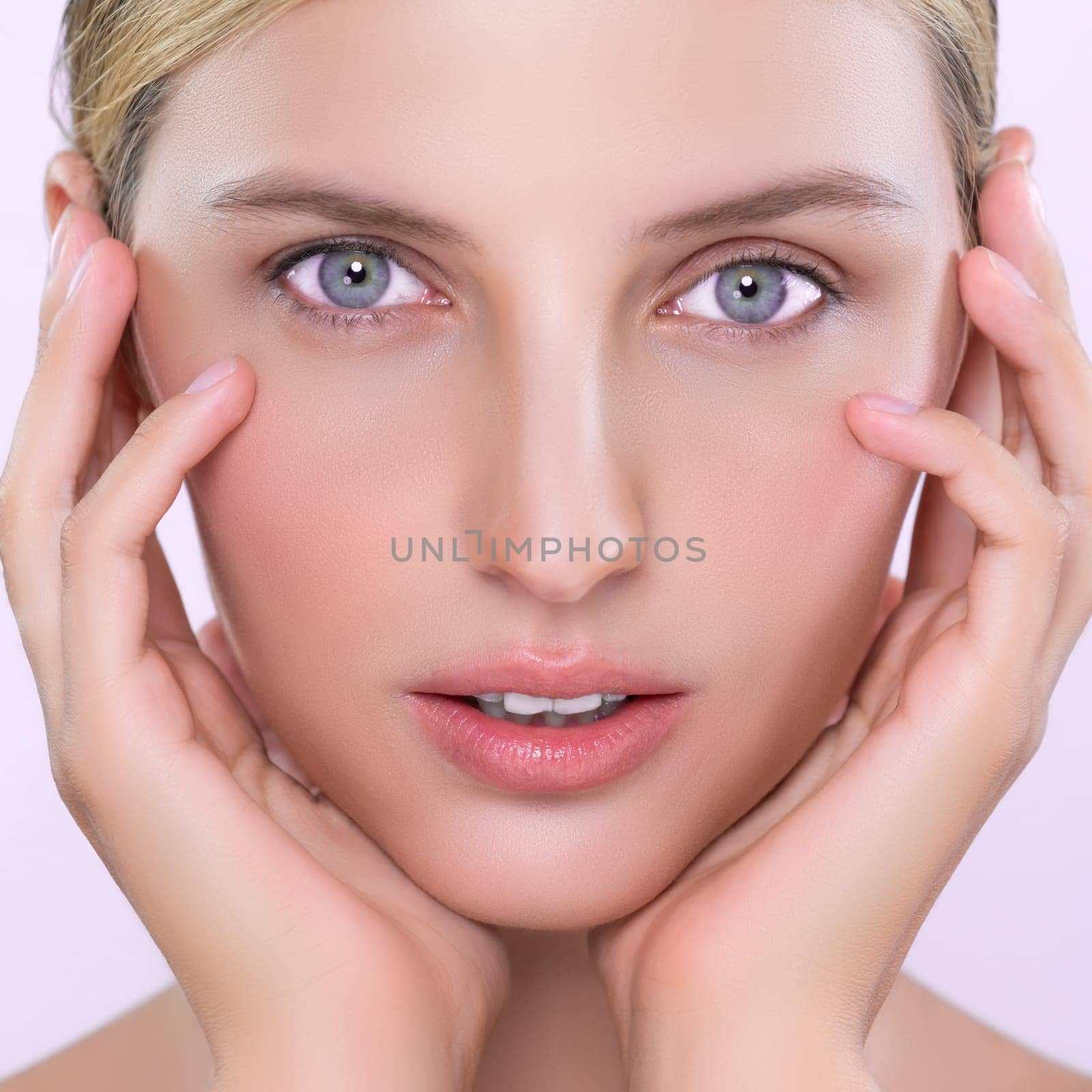 Closeup alluring beautiful woman with perfect smooth and clean skin portrait in isolated background. Beauty hand gesture with expressive facial expression for skincare treatment product or spa.