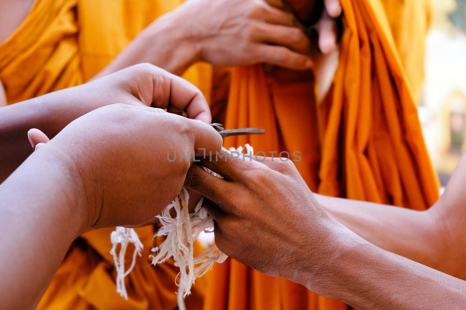 Image of ordination ceremony in buddhism, ceremonial thread