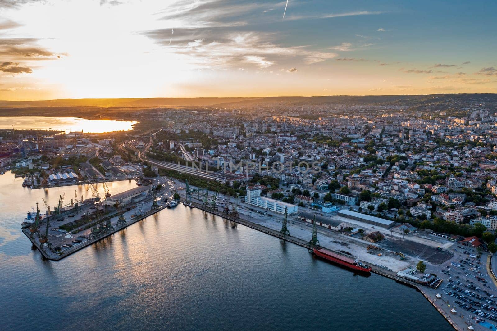 Beauty aerial view of the sea port and industrial zone at sunset in Varna, Bulgaria