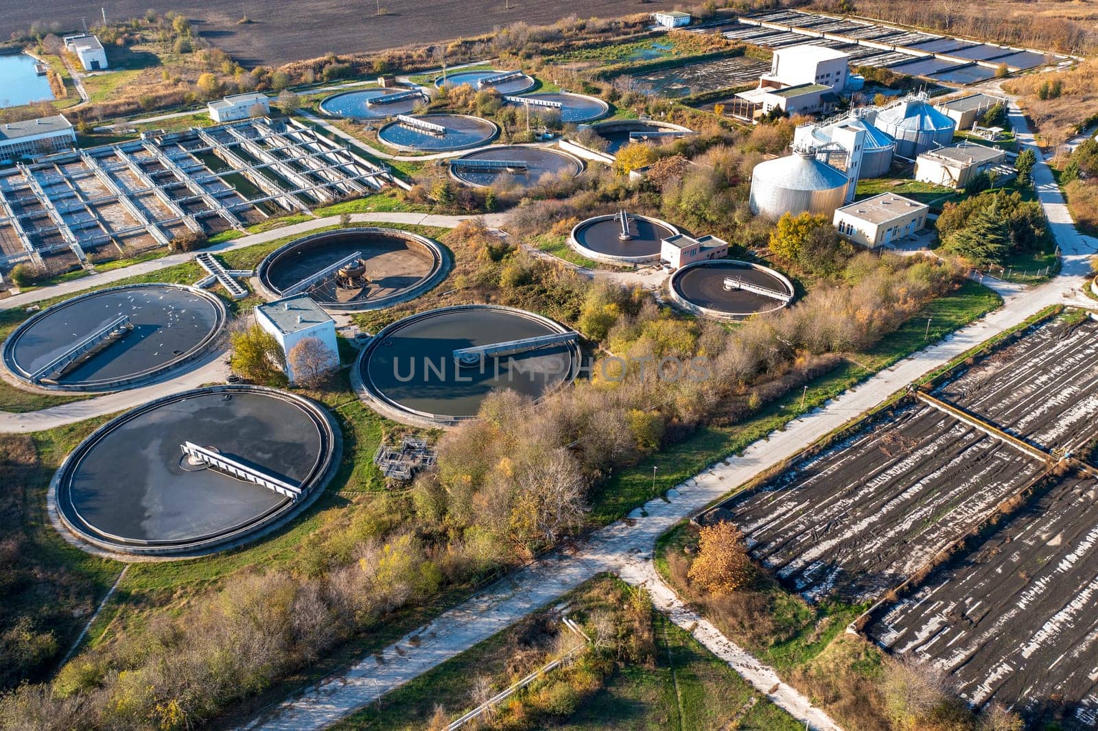 Aerial top view of a city sewage treatment plant.